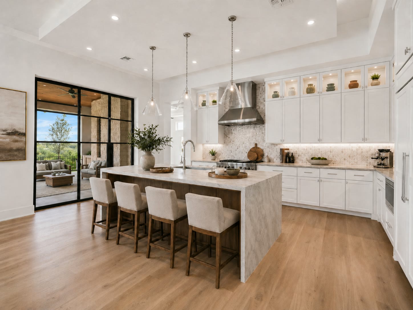 Bright kitchen with large island and Sub-Zero and Wolf appliances at 1043 Overlook Parkway